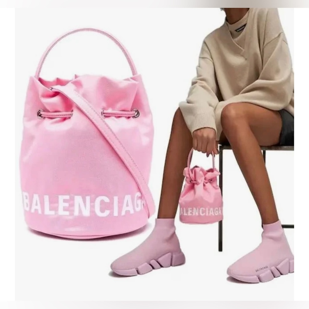 SOLD BALENCIAGA
Wheel XS Drawstring Bucket Bag Pink
